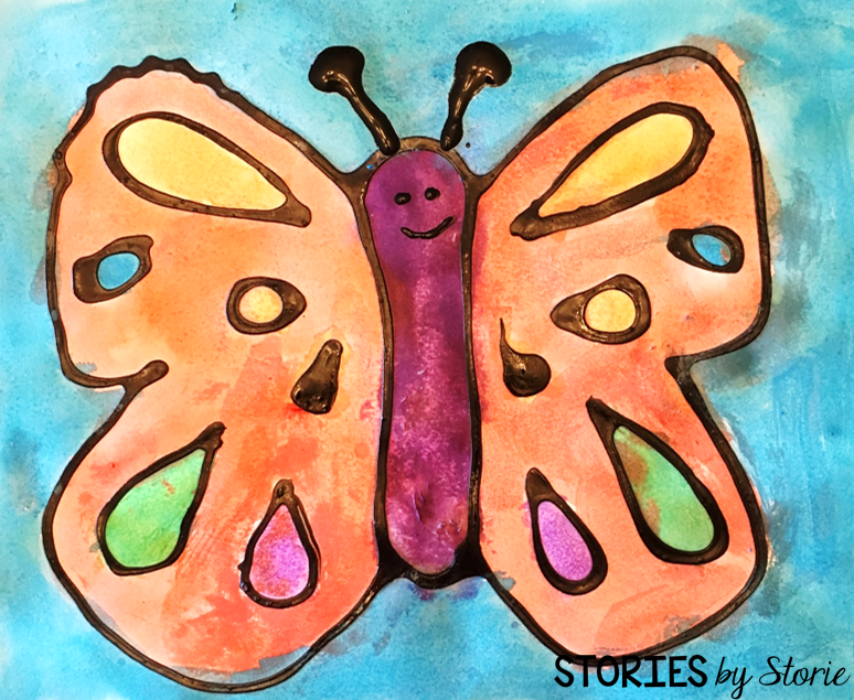 In addition to the apple, my daughter made this black glue butterfly.
